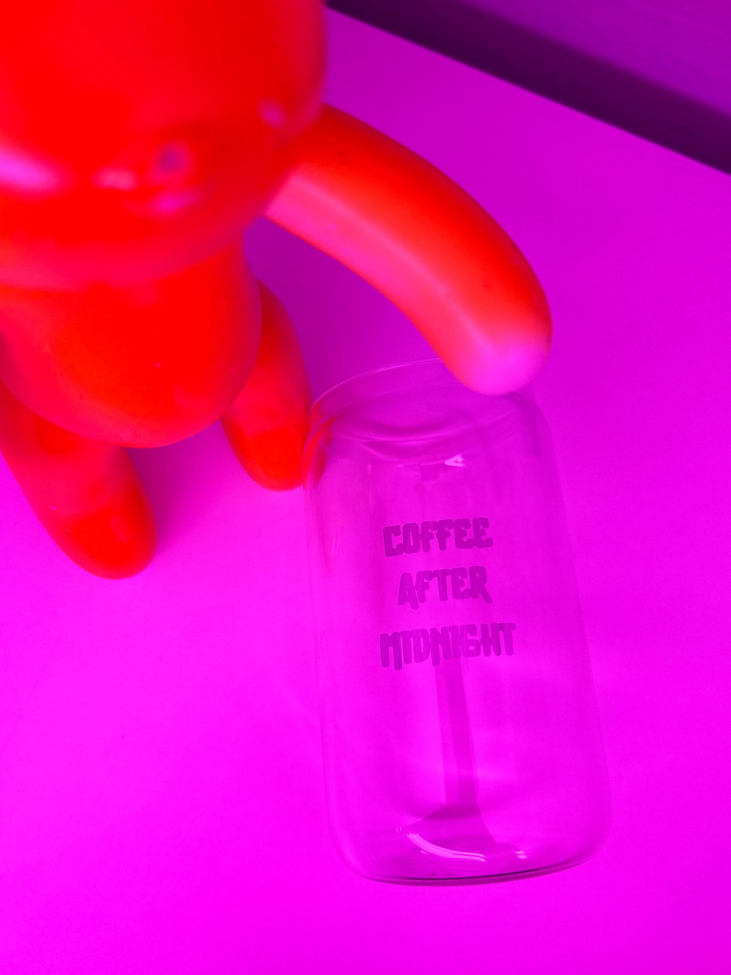 Clear glass with coffee after midnight logo